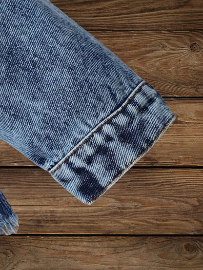 Close-up of sleeve cuff detail on Little Wrangler Raw Hem Denim Jacket for kids