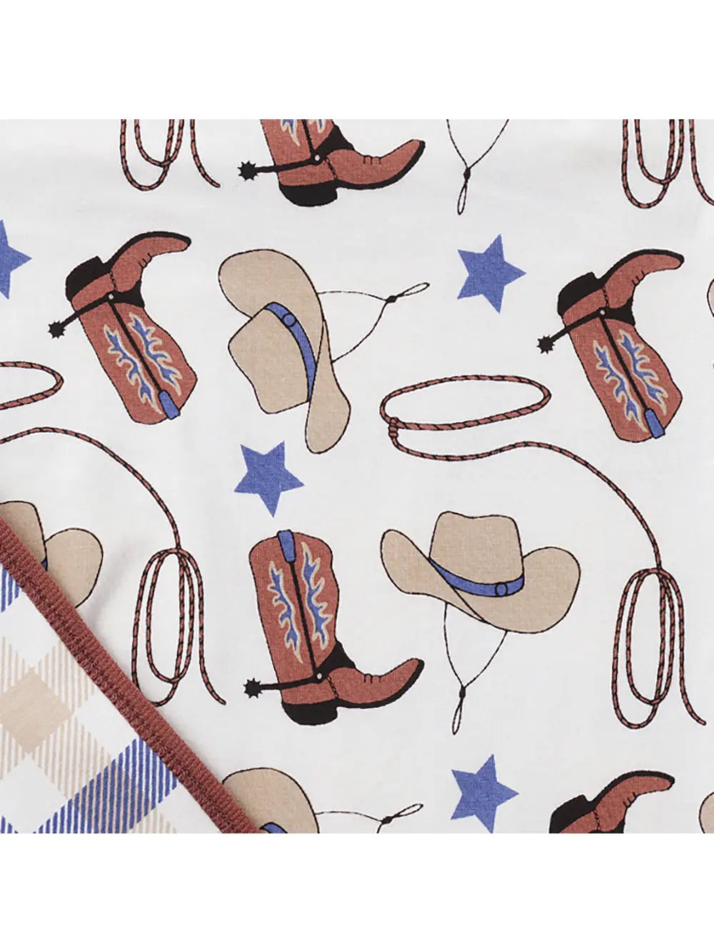 Flatlay showing cowboy boot and hat print on bamboo romper
